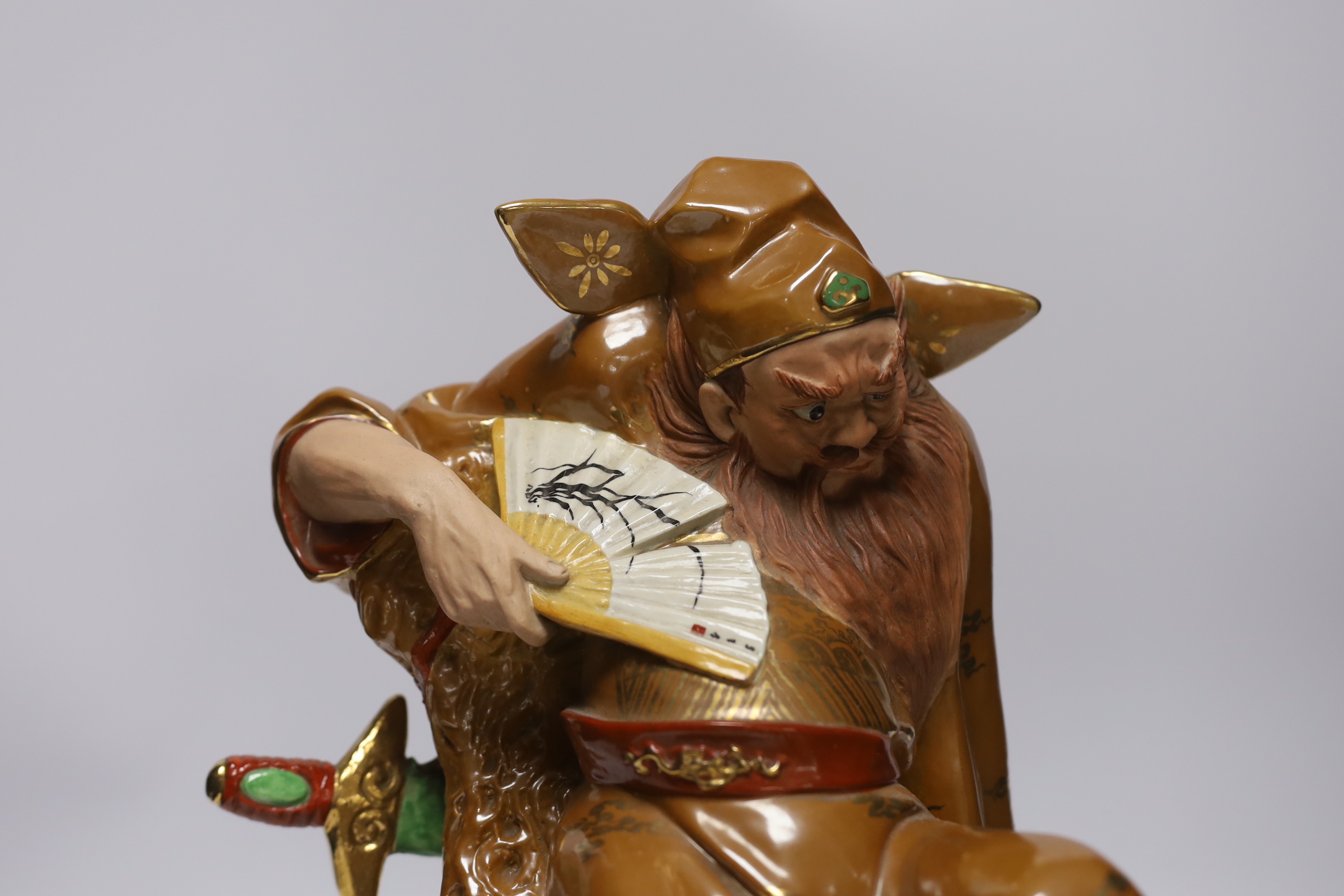 A Chinese enamelled porcelain figure of Li Bai on stand, third quarter 20th century, 39cm high